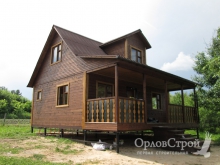 Готовый дом из бруса с мансардой от ОрловСтрой